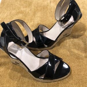 Michael Kors patent black wedge heels size 7.  Excellent used condition.
